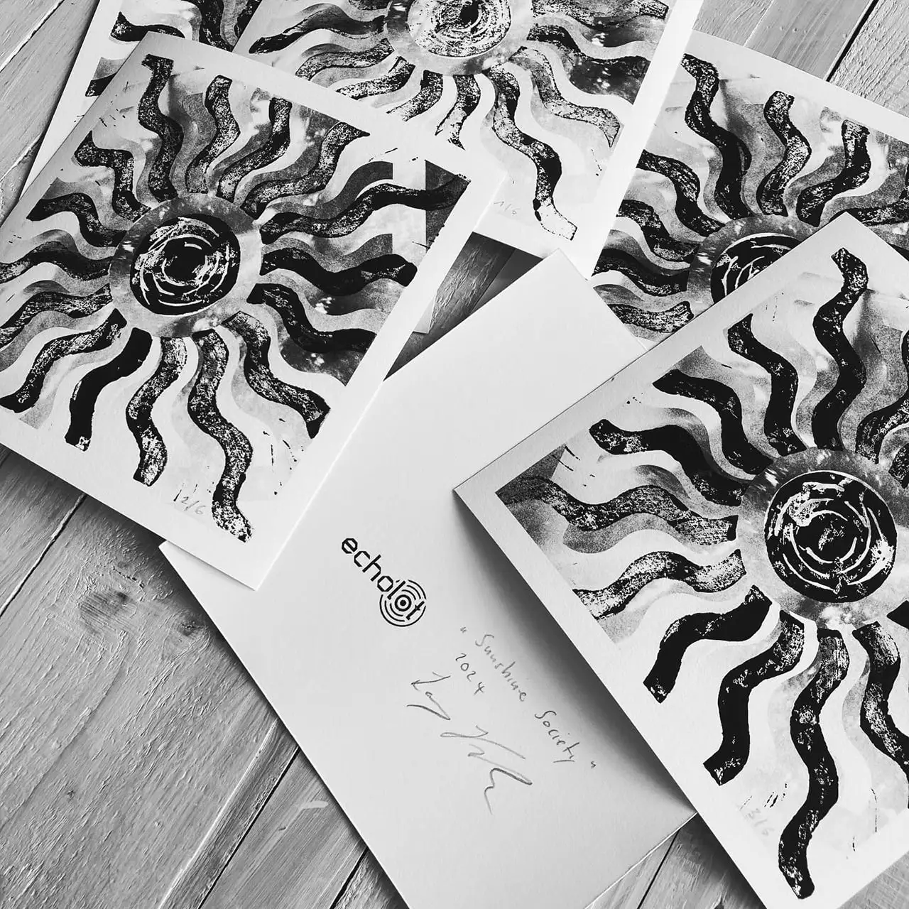 Sunshine Society (echolot016) art prints on a table